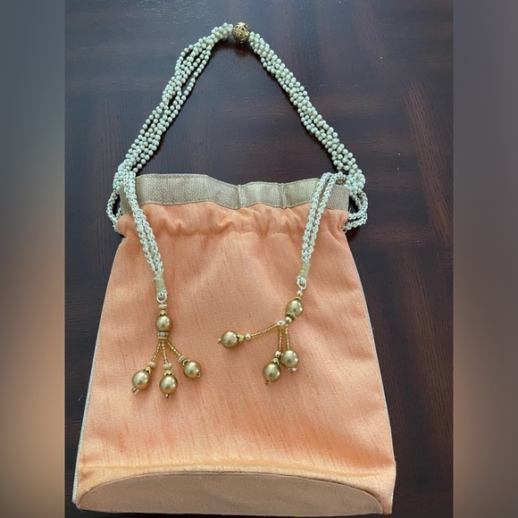 Women’s Luxuries Pearl &glass beads embellished potli bags in peach color - Picture 2 of 7